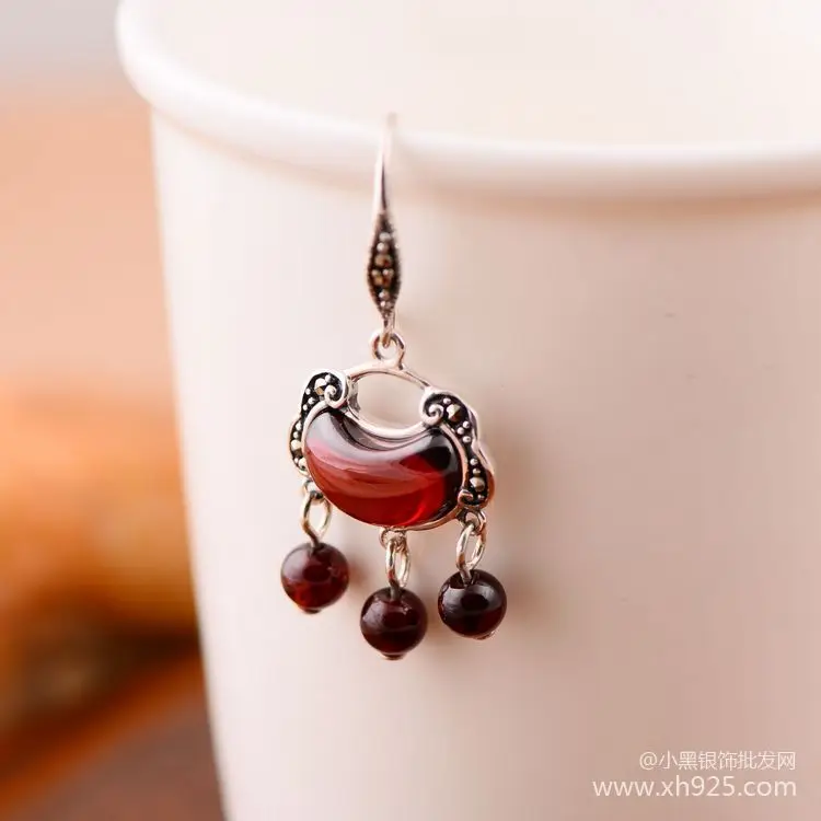 KJJEAXCMY fine jewelry S925 Pure silver jewelry  pomegranate stone lock style national style court tassel earrings