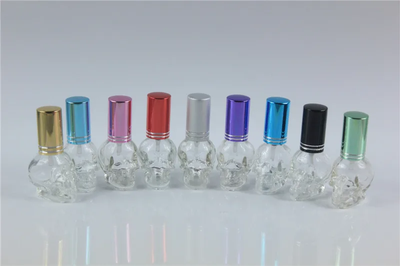 10 قطعة 8 مللي بوضوح الجمجمة شكل مصغرة صغيرة فارغة الزجاج عطر زجاجة عينة زجاجة مع الألومنيوم كاب رذاذ