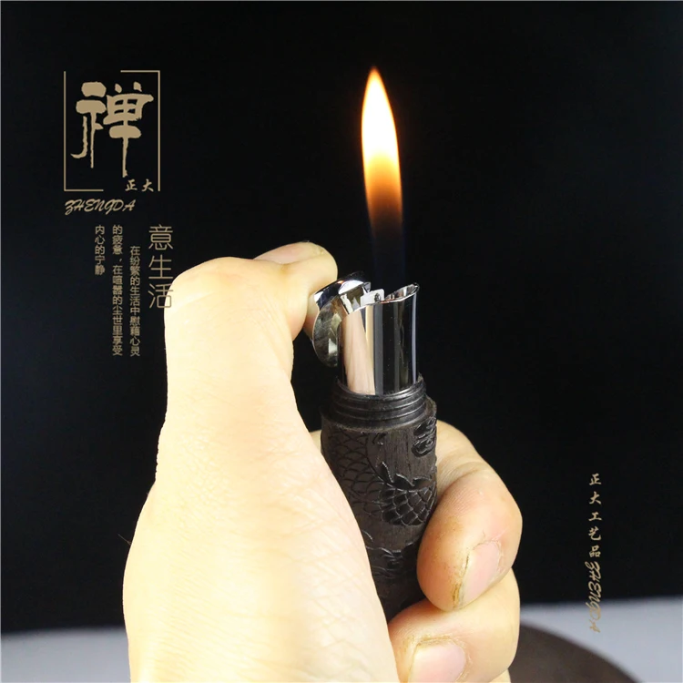 

Is a portable compact personality sculpture smoke black ebony creative shape lighter tan wood lighter wholesale