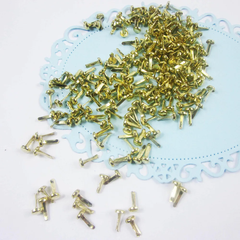 

cheap 500pcs/lot dia 4.5mm golden shining diy decorative brads scrapbooking metal nail embellishment