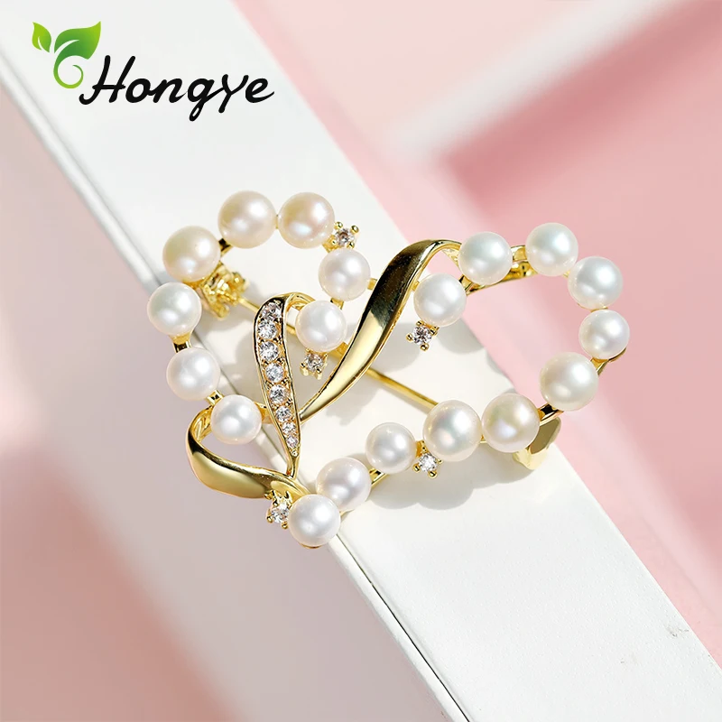 

Hongye Waved Hollow Heart Natural Pearl Brooch for Women Gold Color Beautiful And Luxury Brooch Pins Dresses Coat Jewelry Gift