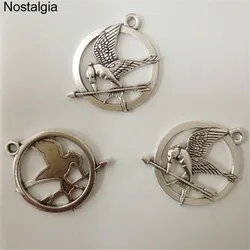 Nostalgia 20Pcs The Hunger Games Ridicule Bird Charms Movie Jewelry Pendant 28*29MM