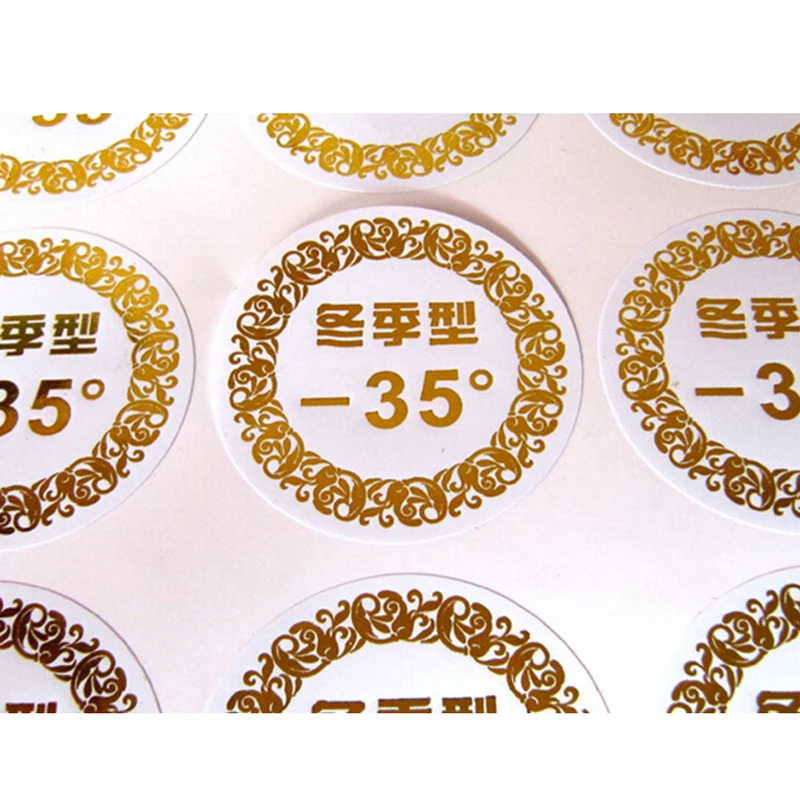 Wholesale custom printing rose gold foil logo paper labels biodegradable self adhesive round product sticker roll