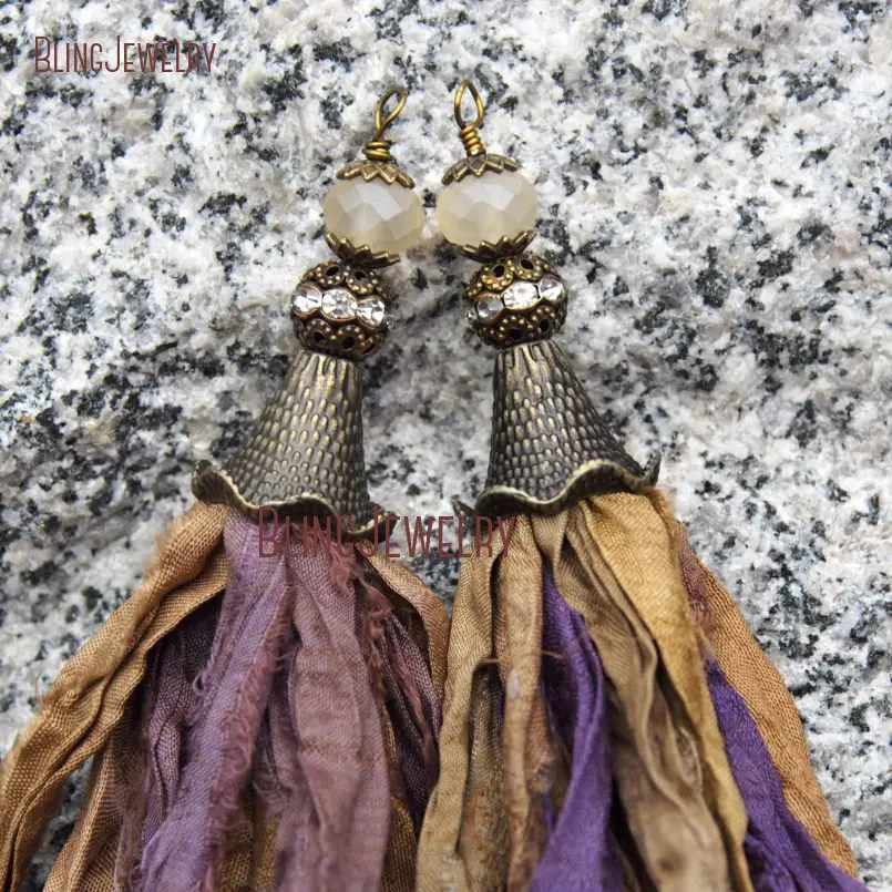 

Fallen Leaf Sari Silk Tassel Pendant Antique Bronze Cap and Matte Crystal Accent PM9149