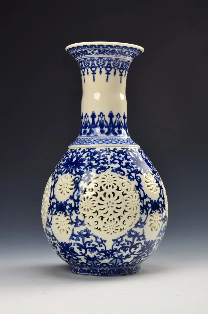 

Exquisite Chinese archaize Hand-carved blue and white porcelain double layers hollow-out vase