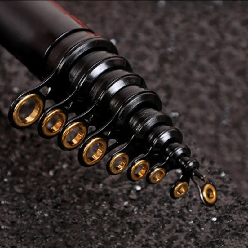 Superhard rock fishing rod carbon sea pole long throw telescopic spinning fishing rod reddish black