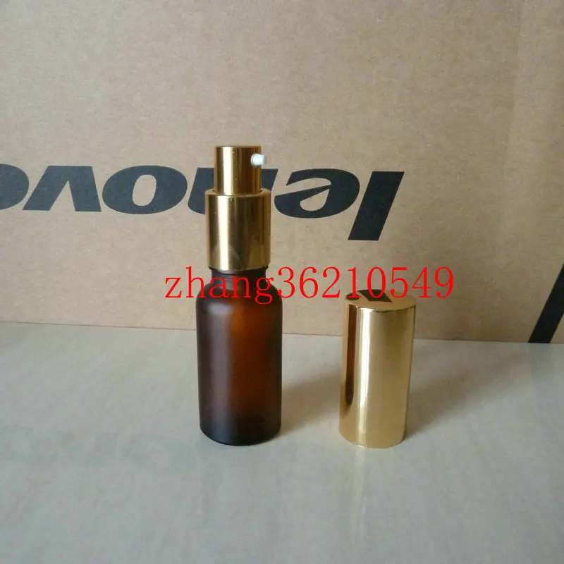 

30pcs 20ml brown/amber frosted Glass lotion Bottle With aluminum shiny gold pump for lotion and essential oil