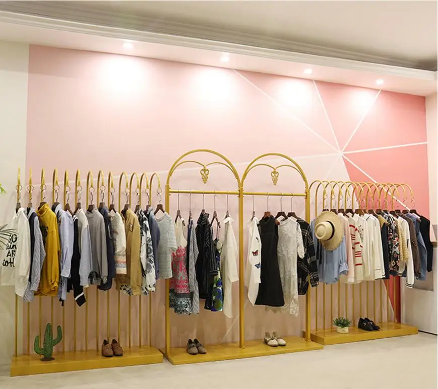 Golden display rack for clothes rack in Zhongdao clothing store, display rack for women's clothes store with landing personality