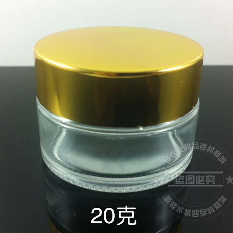 

wholesale 30pcs empty 20g clear glass cream jar with shiny gold aluminum lid, wholesale glass 20 grams cosmetic jar for cream