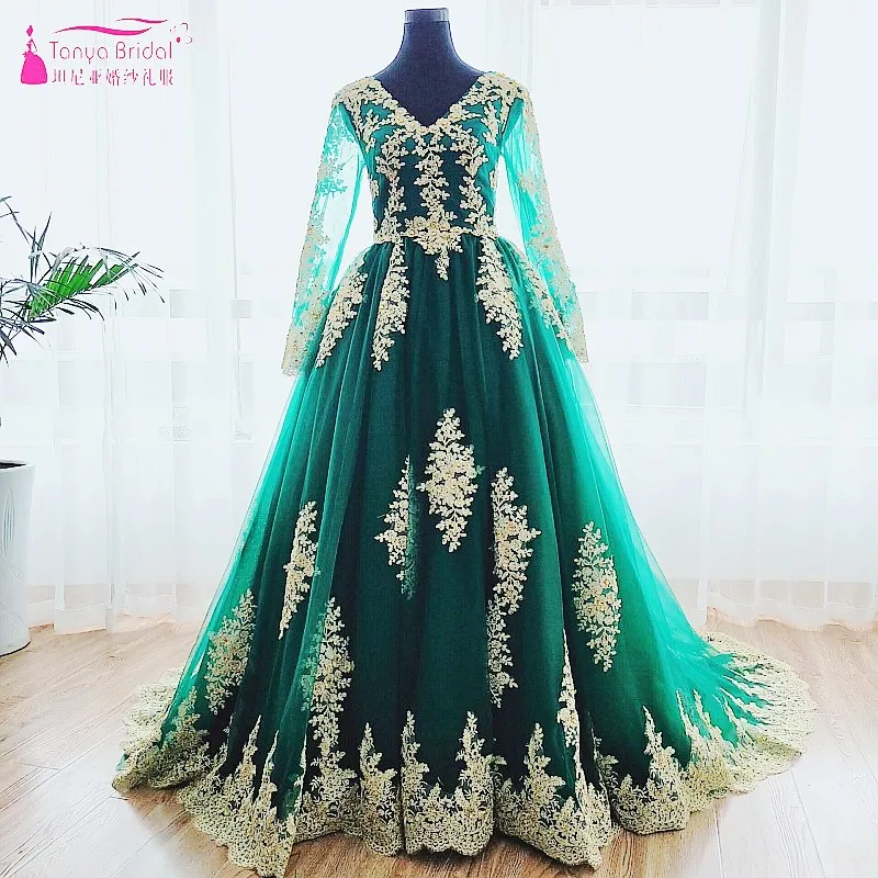 sparkly emerald green prom dress Beaded Emerald Green Prom Dress with Sparkly Corset and Tiered A-Line Slit