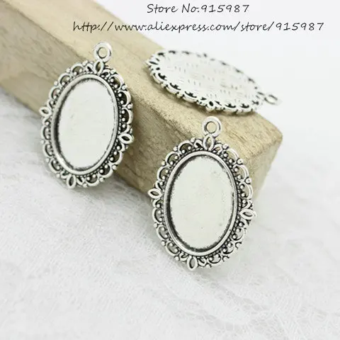 

Sweet Bell Free Shipping 40pcs/lot Antique Tone Oval filigree Frame Cameo Settings 22*30mm (Fit 13*18mm) 7A1107