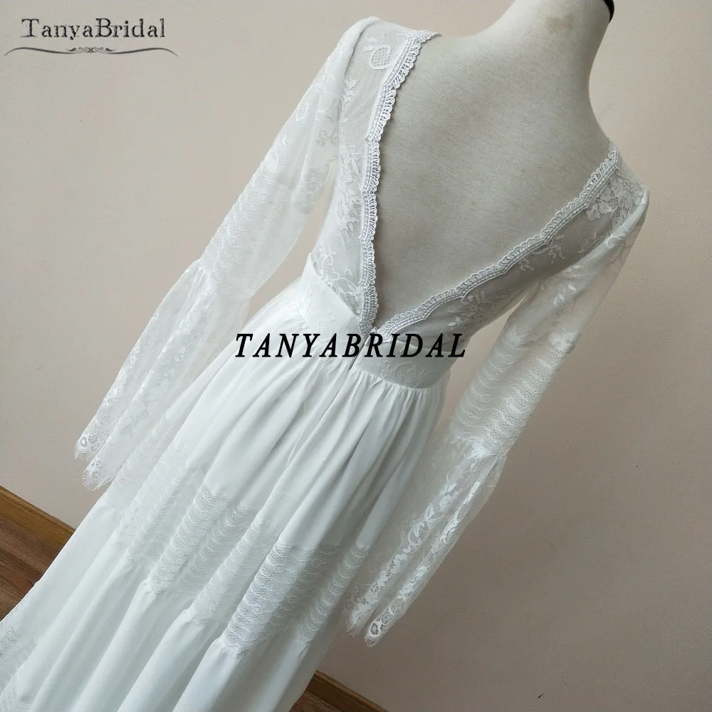 정교한 보헤미안 웨딩 드레스 긴 소매 레이스 비치 신부 가운 플레어 슬리브 백리스 베스 티드 드 Noiva 세련된 DW047