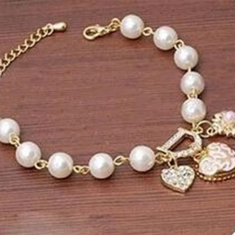 2025 سوار نسائي عصري على شكل زهرة نباتية لؤلؤية مقلدة #1