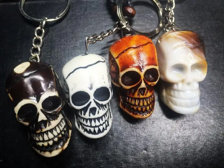 4 pcs Retro Carved Skull Head Cool Rock Keychain