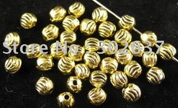 

FREE SHIPPING 900pcs Antiqued gold plt lined round spacer beads 4mm A157G