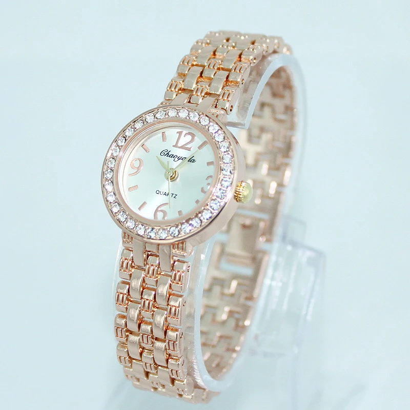 高級レザー女性のドレスウォッチ腕時計ファッションレディースブレスレット女性ラウンド時計クォーツ時計