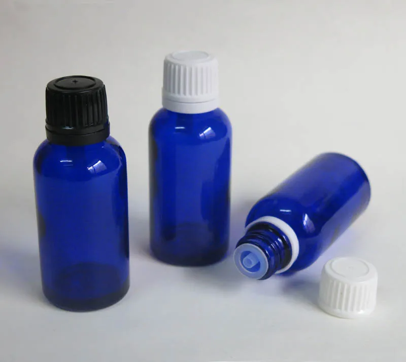 

wholesale - 100 X 30ml blue Glass Bottle, 30cc Glass Container with plastic lids, 1oz glass Cosmetic Packaging fro sale