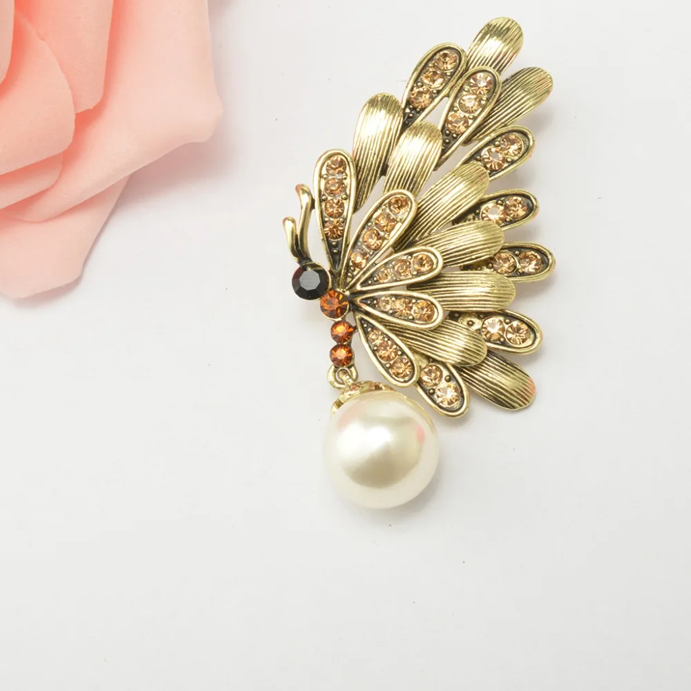 New Pearl Pendant Broches para as mulheres Pin Cute Wing Shiny Costume Jewelry Accessories Animal Brooches for Women Brosche