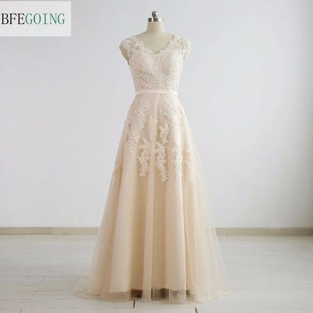 Champagne Tulle Appliques A-Line abito da sposa lunghezza pavimento Sweep/spazzola treno scollo a v foto reali/originali su misura