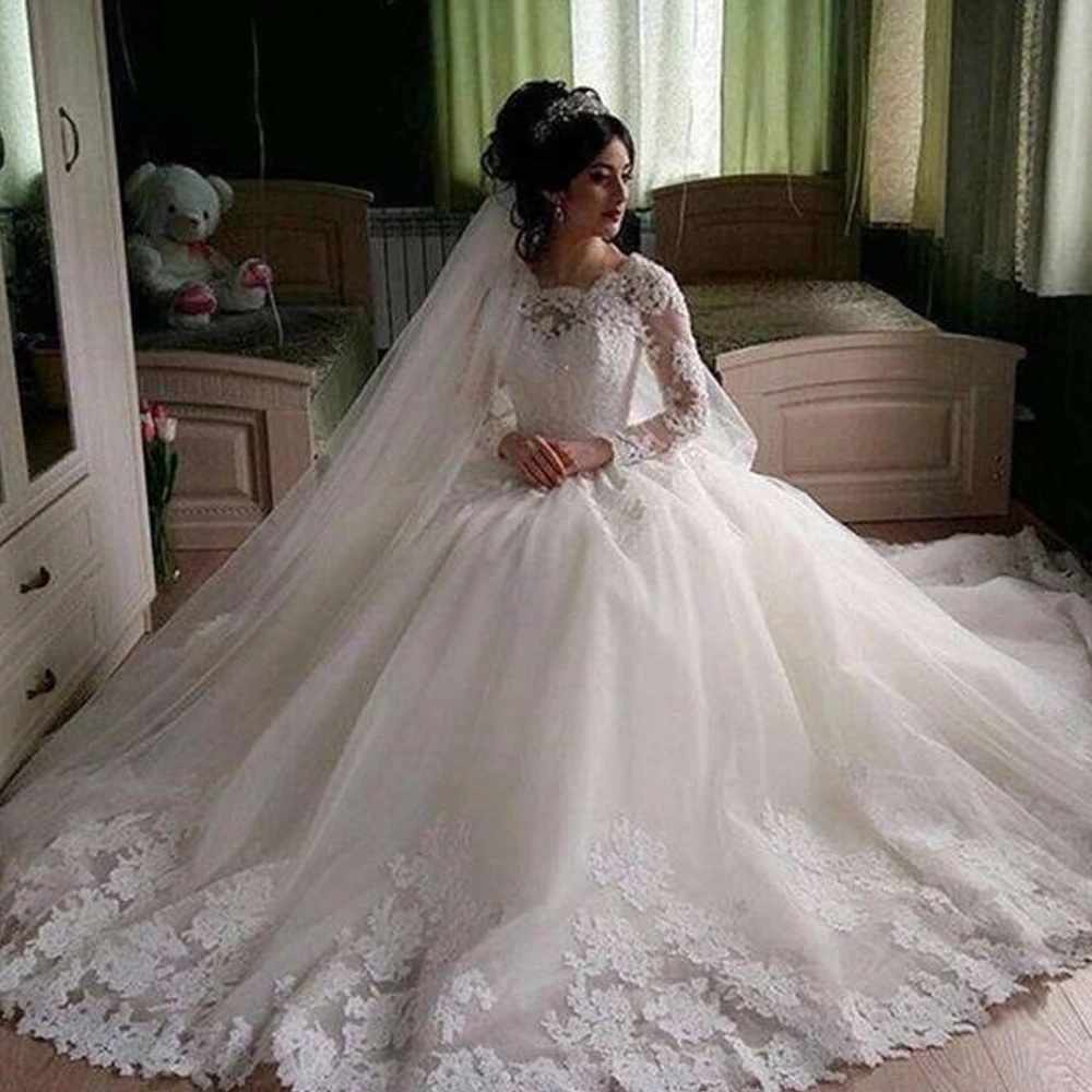 

Ball Gown Wedding Dresses 2019 Crew Neckline Lace Appliques Long Transparent Sleeve Puffy Floor Length Bridal Dresses Gowns