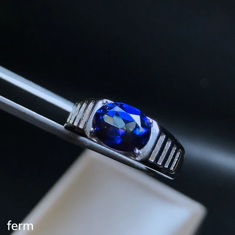 

KJJEAXCMY fine jewelry 925 pure silver inlaid with natural blue topaz ring with small and unusual flowers