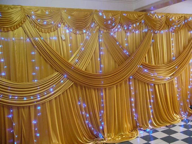 2024 Hot Gold Ice Silk Wedding Backdrops with Swag Stage Background Drape and Curtain 20ft (w) x 10ft (h) for wedding decoration