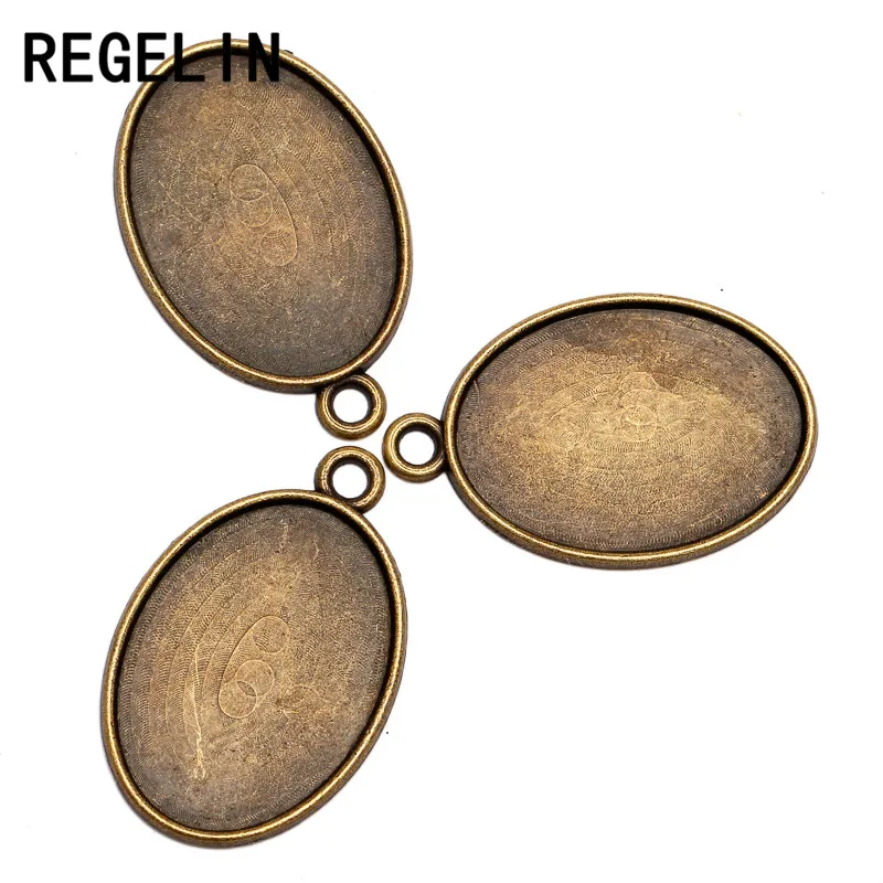 REGELIN 20 pcs Antique Bronze Oval Pingente Blanks Apreciação Jóias Fit18 * 25mm de diâmetro Acessórios Jóias DIY