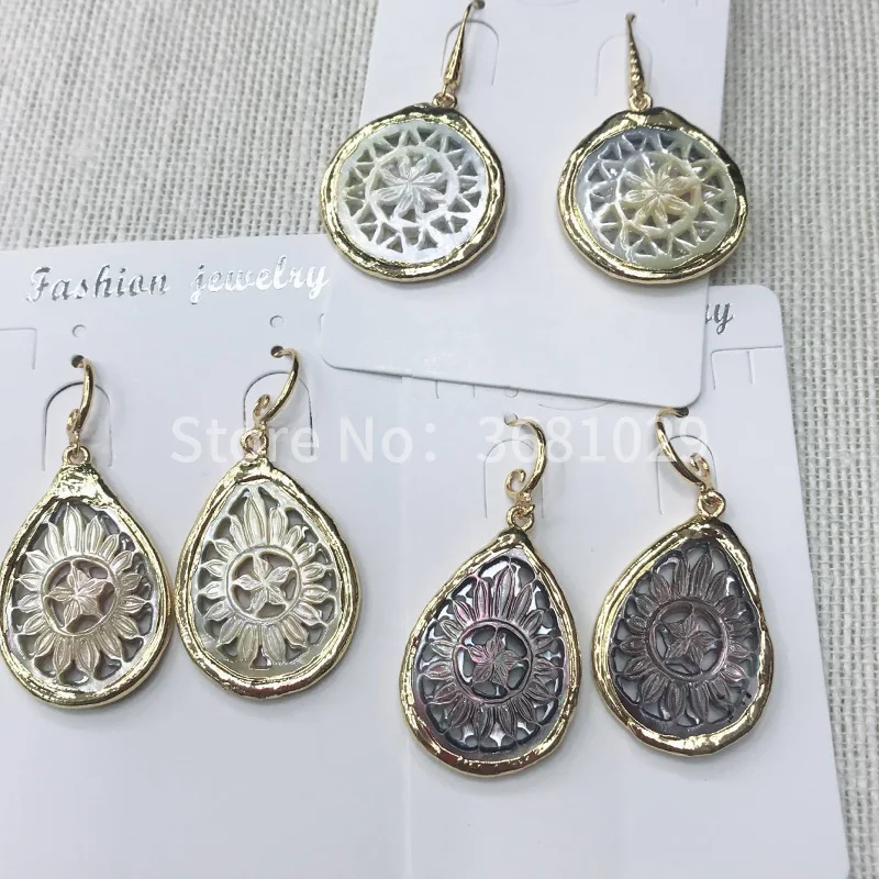 

2018 fashionable retro temperament hand-carved shell earrings