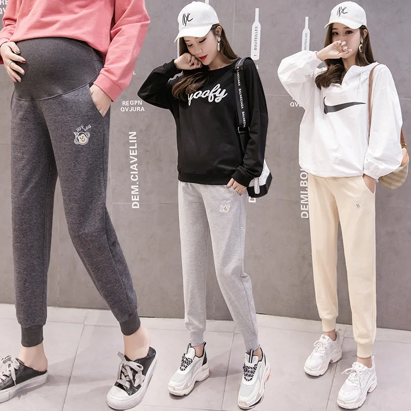 

Pregnant women nine points sports pants casual loose stomach lift pants pregnant women harem pants wear maternity clothes