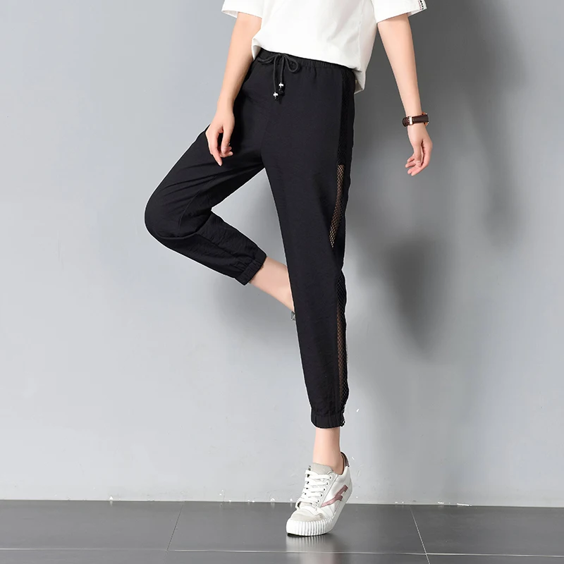 New large size female pants summer thin section loose harem pants was thin black hollow nine points carrot pants TB18100