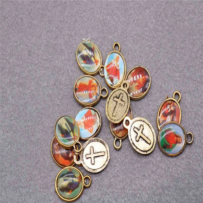 100 pieces of religious icons amulet various Jesus icons handmade medals day charm handmade jewelry DIY accessories