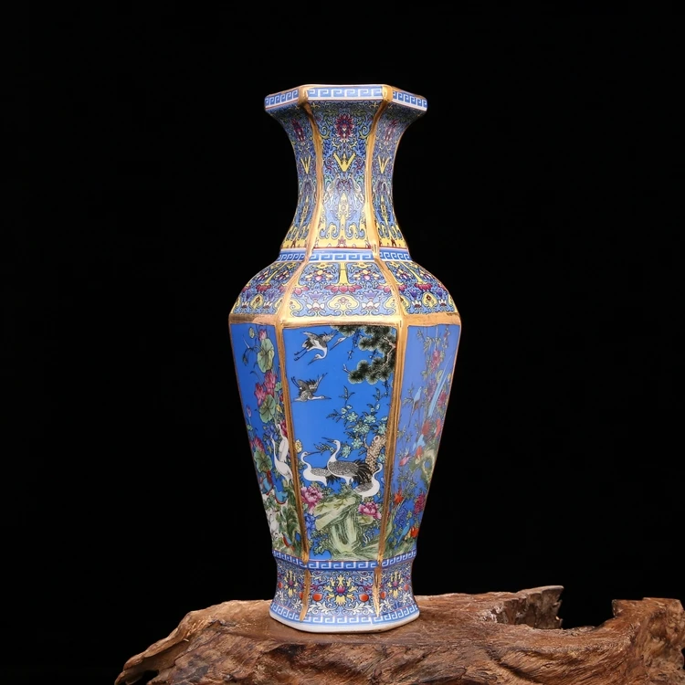 

Yong Zheng in the Qing Dynasty blue enamel flower and bird vase hexagonal antique porcelain