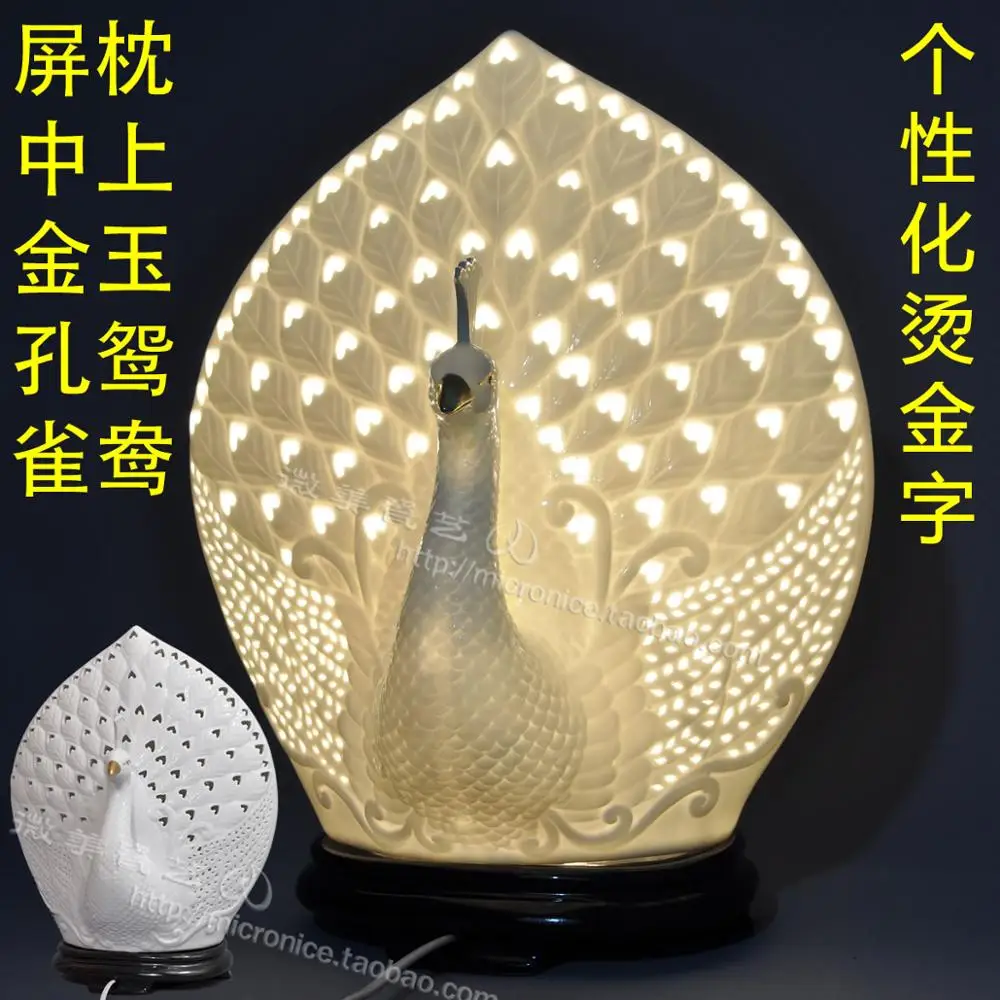 Peacock white porcelain lamp hollow lamp bedside lamp light in the bedroom modern pastoral real wedding wedding engagement