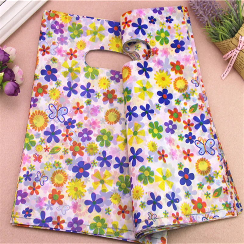 2021 New Style Wholesale 100pcs/lot 20*30cm Colorful Sunflower Packaging Gift Pouches Plastic Shopping Present Gift Bags