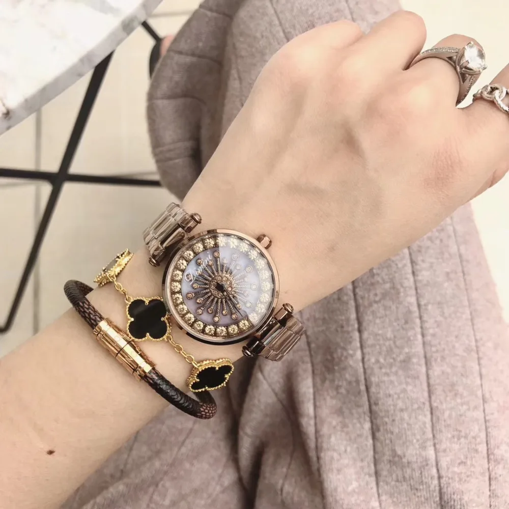 Antique Caramel Bracelet Watches for Women Cool Sexual Cold Wind Anti Fade Full Steel Spinning Crystal Flower Watch Rotating