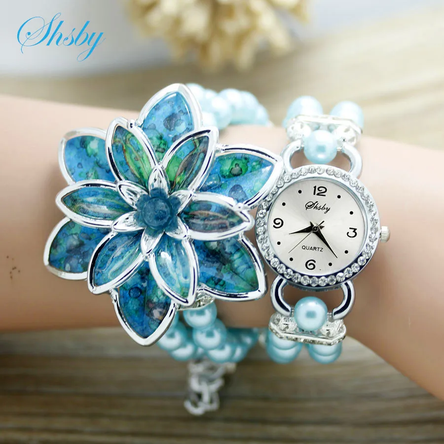 

Shsby Fashion Women Rhinestone Watches Ladies Pearl Strap Many Petals Flower Bracelet Quartz Wristwatches Women Dress Watches