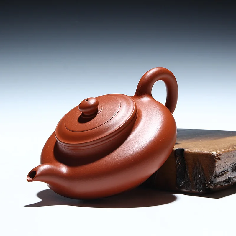 Yixing red clay teapot boutique ball hole water flat pot teapot 100 ml LOGO mass customization mixed batch of special offer