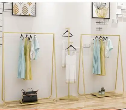 The new clothes store display rack is a floor-to-ceiling women's clothing rack.