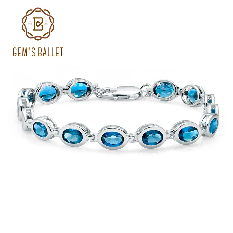 

Женский браслет с овальным голубым топазом 15 карат, из серебра 925 пробы