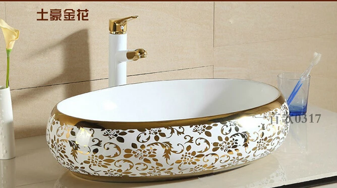 European stage basin. Ceramic Mosaic gold lavabo. Oval. Golden lavatory.