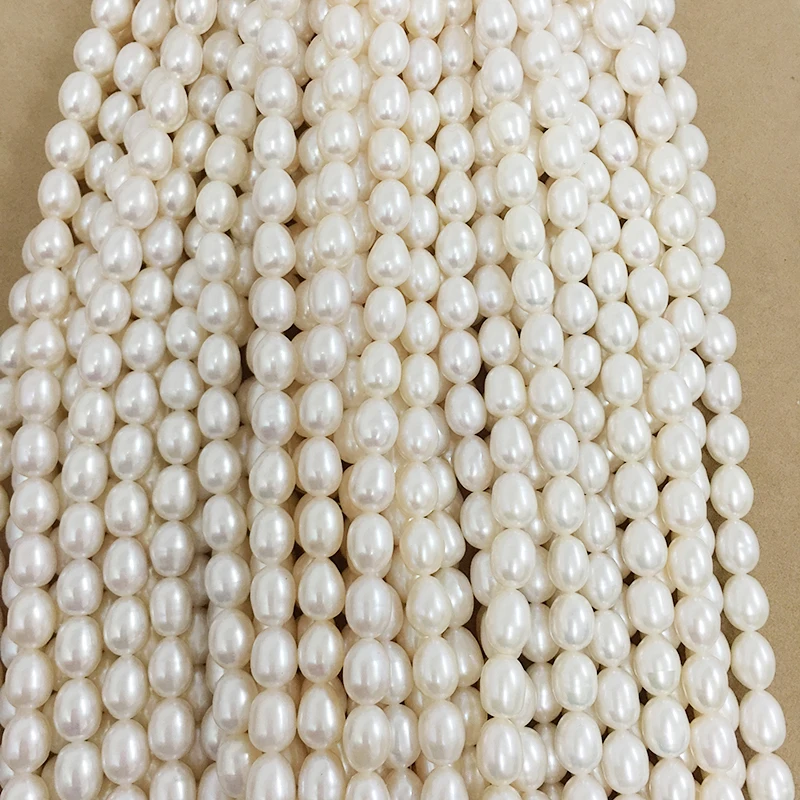 

High luster pearl beads ,100% nature freshwater pearl material with oval shape,rice pearl diameter 7-8 mm, length 9-10 mm