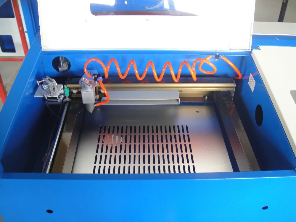 

laser cnc router,cut machine, engrave on iphone and ipad chassis 40w 50 w 60w 80w free ship