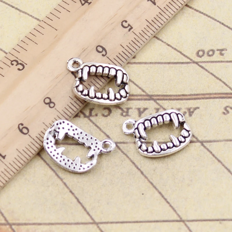 20 piezas de dijes vampiro Dracula colmillos dientes 17x12mm Color plata tibetana colgantes joyería antigua fabricación artesanal DIY