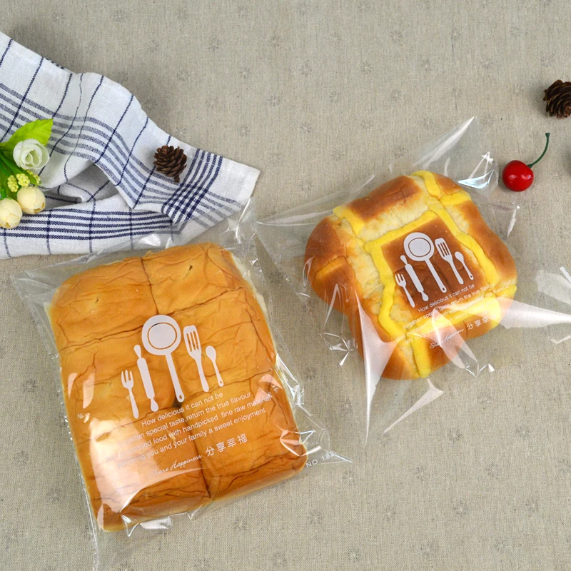 

100pcs Free shipping Transparent Biscuit bag Bakery packaging Bread bag Food delivery Plastic bags Adhesive seal Bakery bag