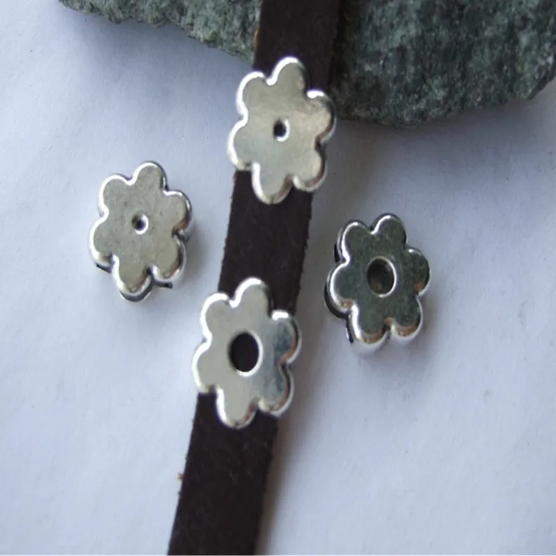 10 Pcs Antique  Sun Flower Shaped Zinc Alloy Slider Spacers For 10*2mm Flat Leather Cord Jewelry Fittings