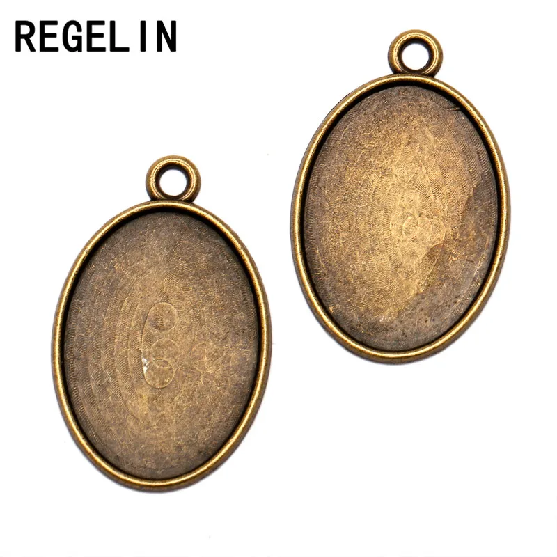 REGELIN 20pcs Antique Bronze Oval Pendant Blanks Jewelry Findings Fit18*25mm dia DIY Jewelry Accessories