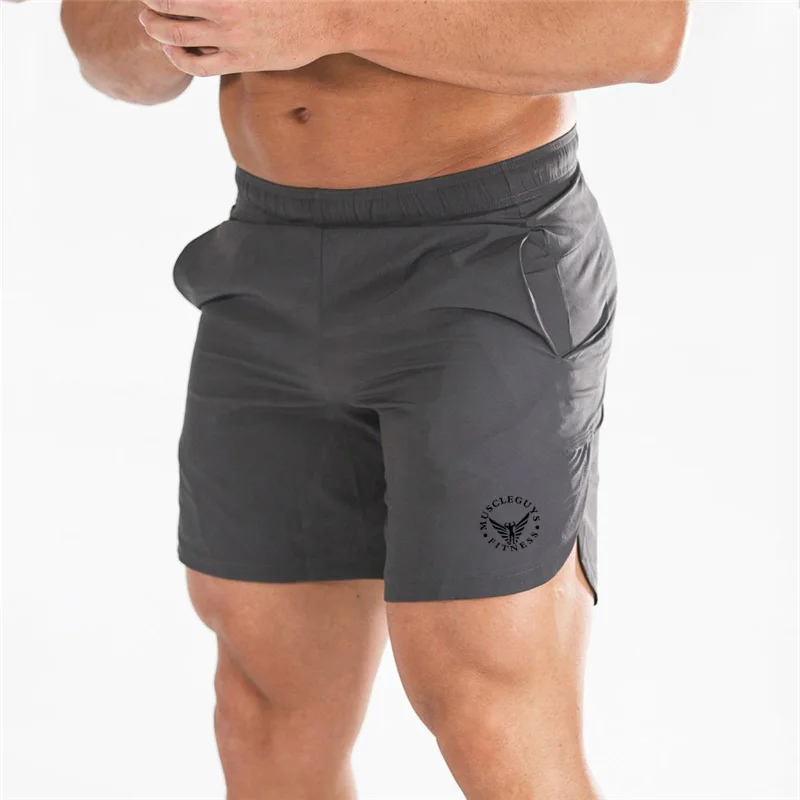 Pantalones cortos de Fitness para hombre, ropa de marca profesional para culturismo, entrenamiento, secado rápido