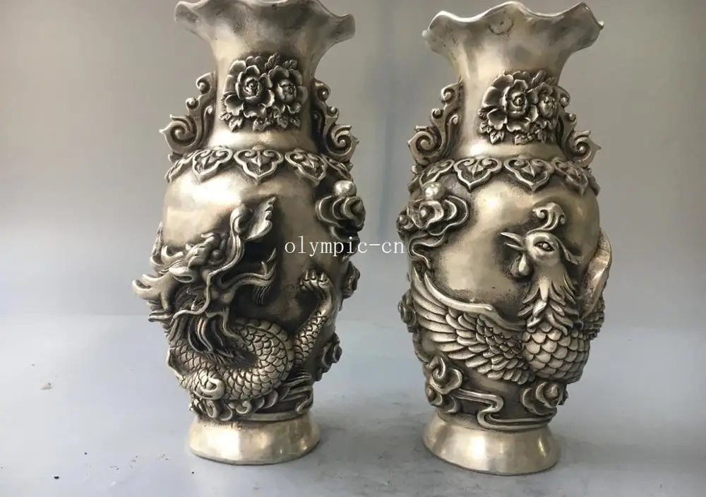 

A Pair 9'' tibetan bronze silver carved cloud dragon phoenix design vase statue 21CM