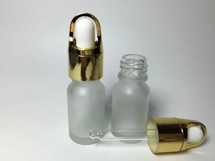 

50PCS wholesale 10ml clear frost glass essential oil bottle with gold of lid , 10 ml essential oils glass sub-bottling bottle