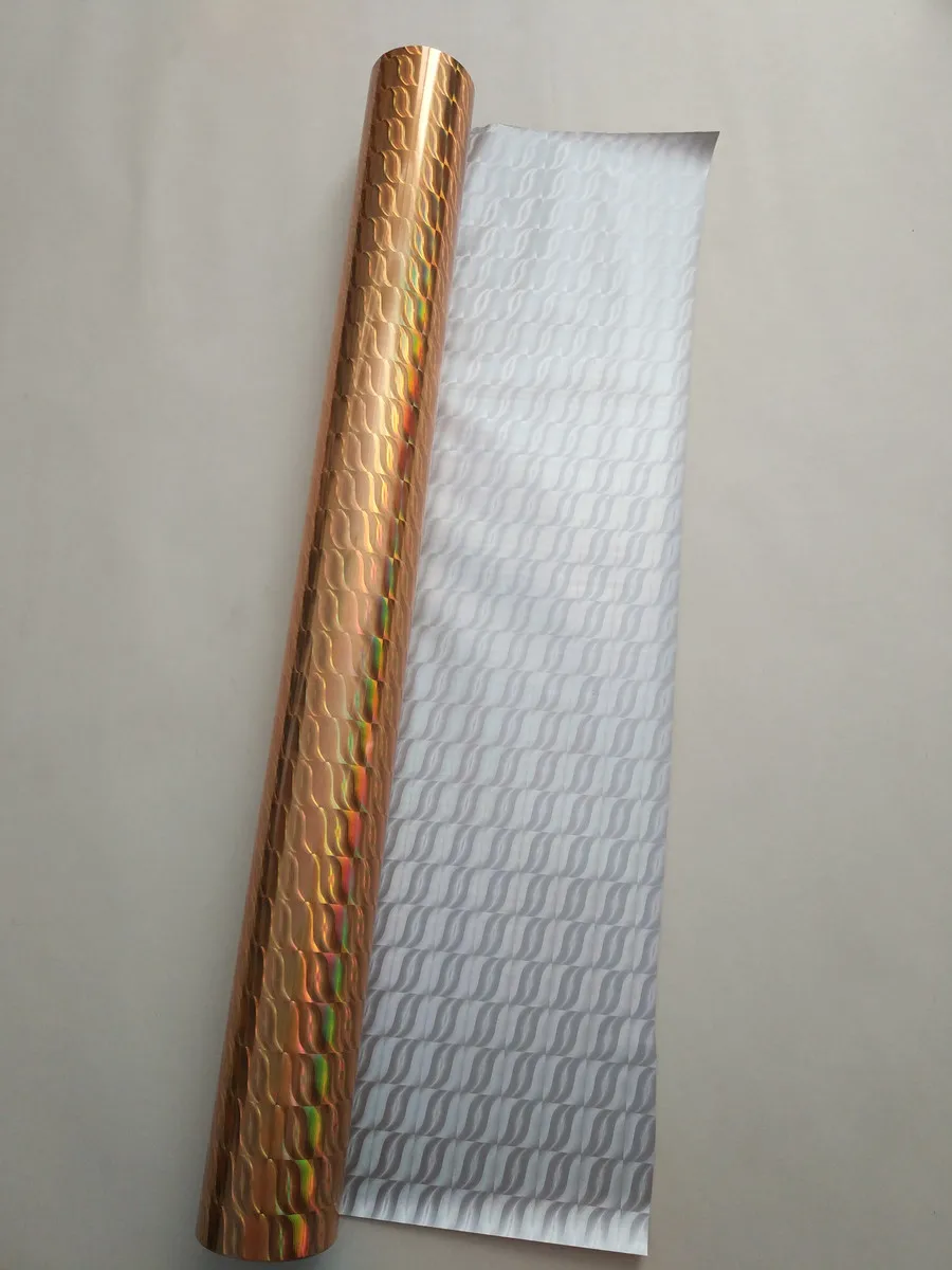 Holographic foil gold color surge pattern A11 hot press on  paper or plastic 64cm x 120m stamping foil